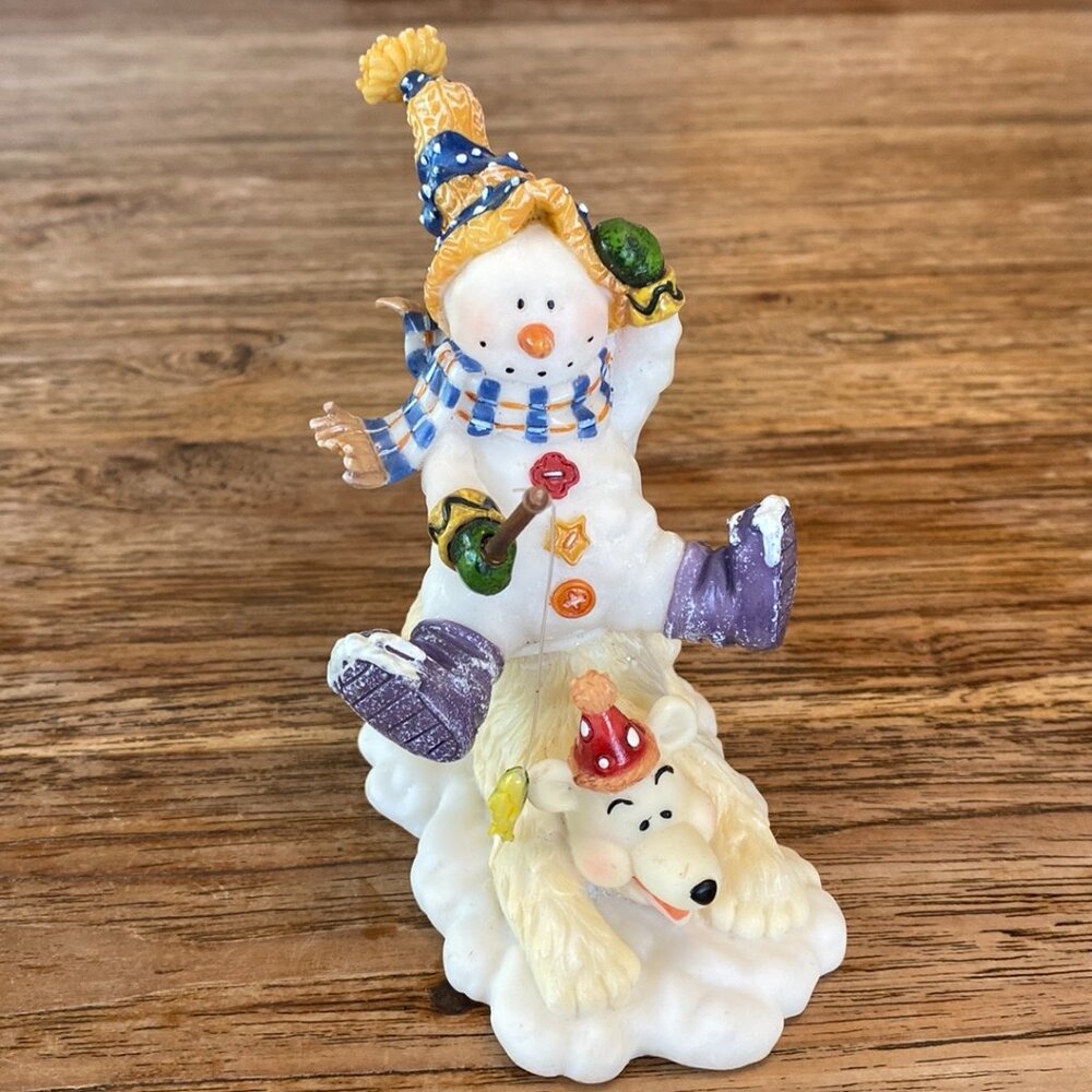 Cute Snowman Fishing Sitting on a Polar Bear